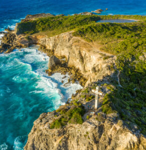 Aerial photo of the extreme east coast of Guadeloupe, a shattered land hammered by the atlantic ocean : la pointe des chateaux